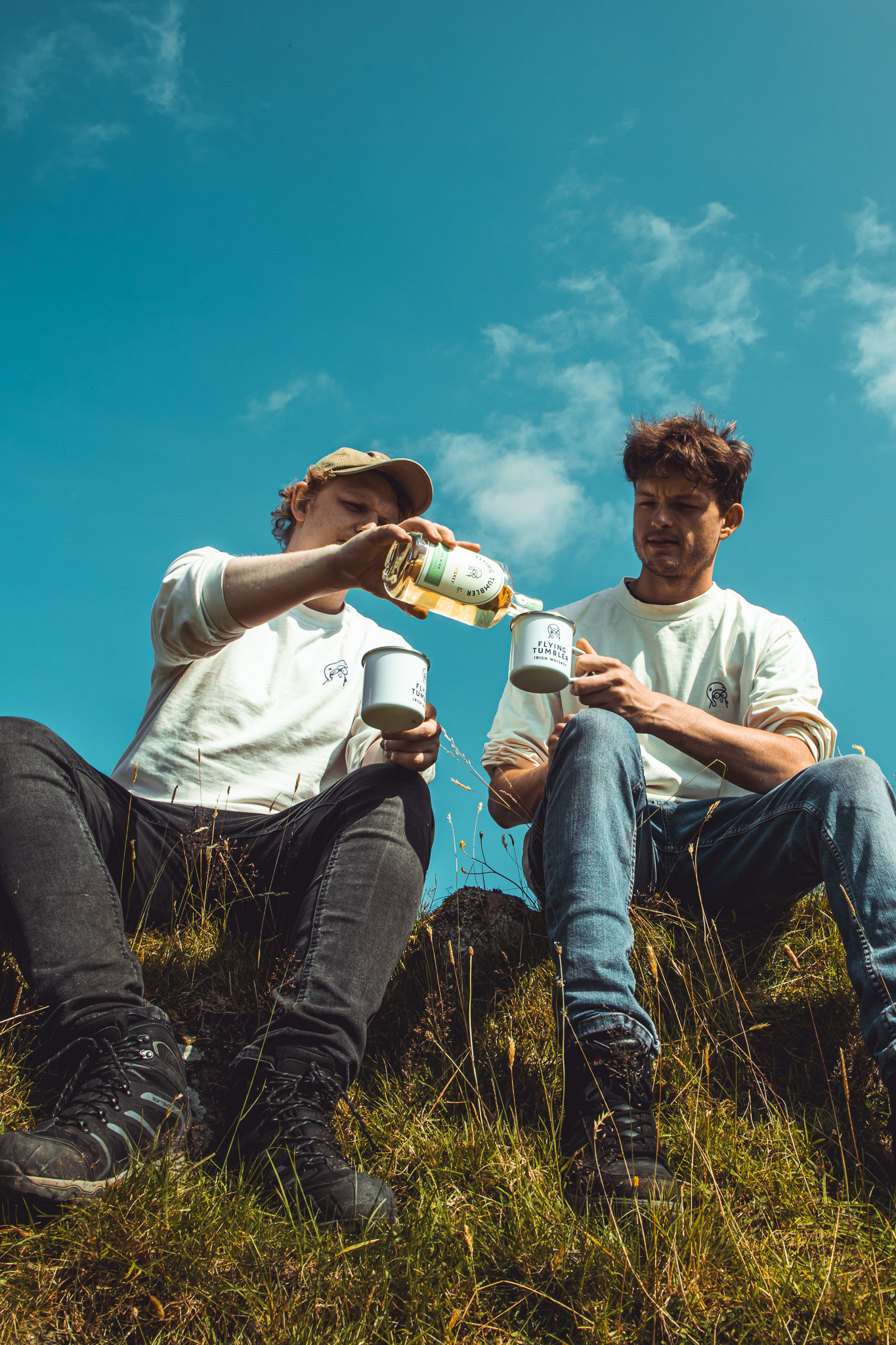 The Flying Tumbler founders — sharing a dram on the hillside